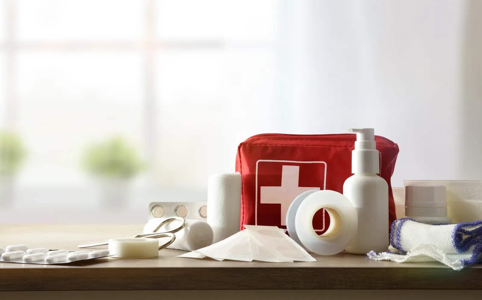 First aid kit laid out on a table, ready if a client gets injured mid session