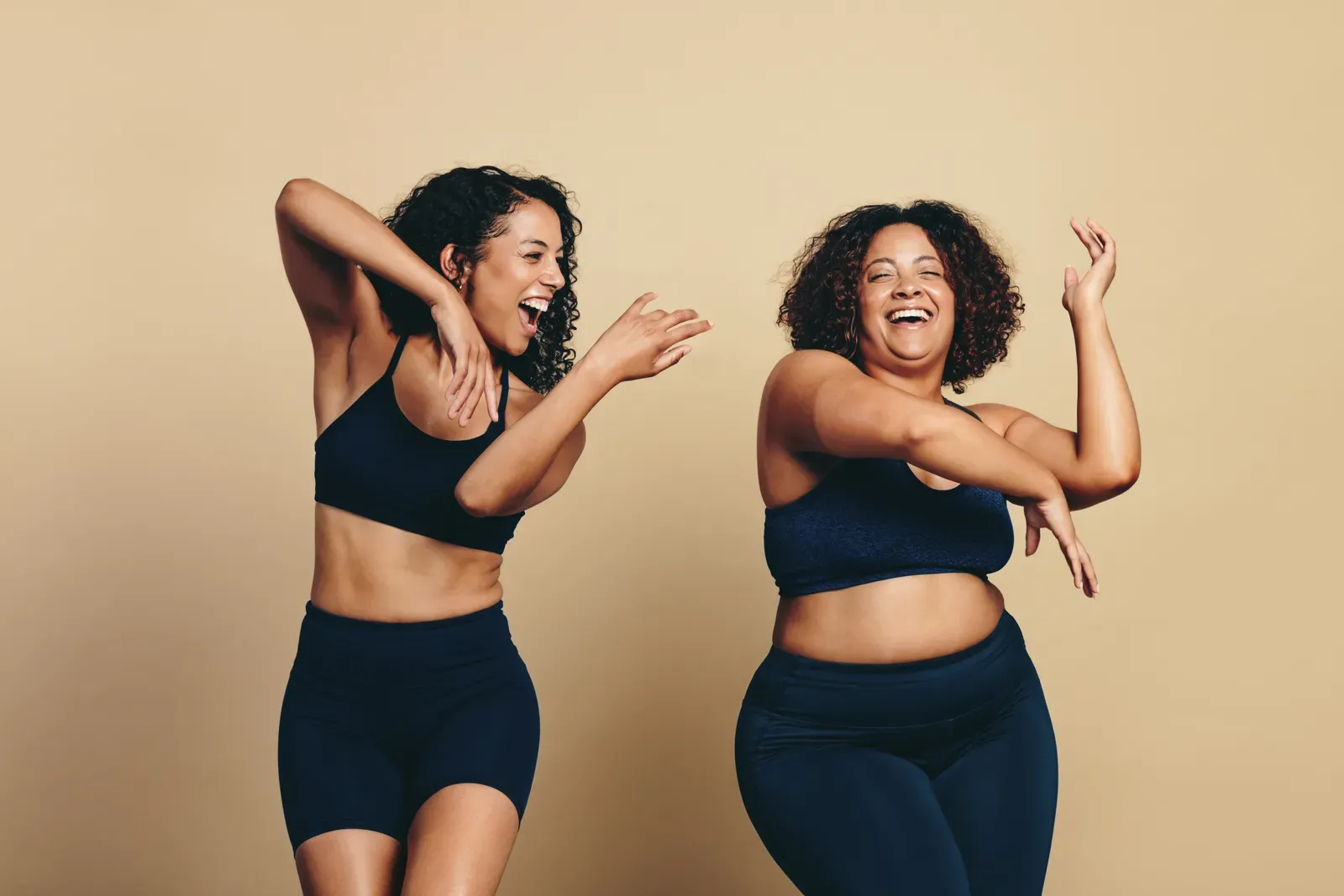 Dance fitness instructor leading an energetic routine in a bright room