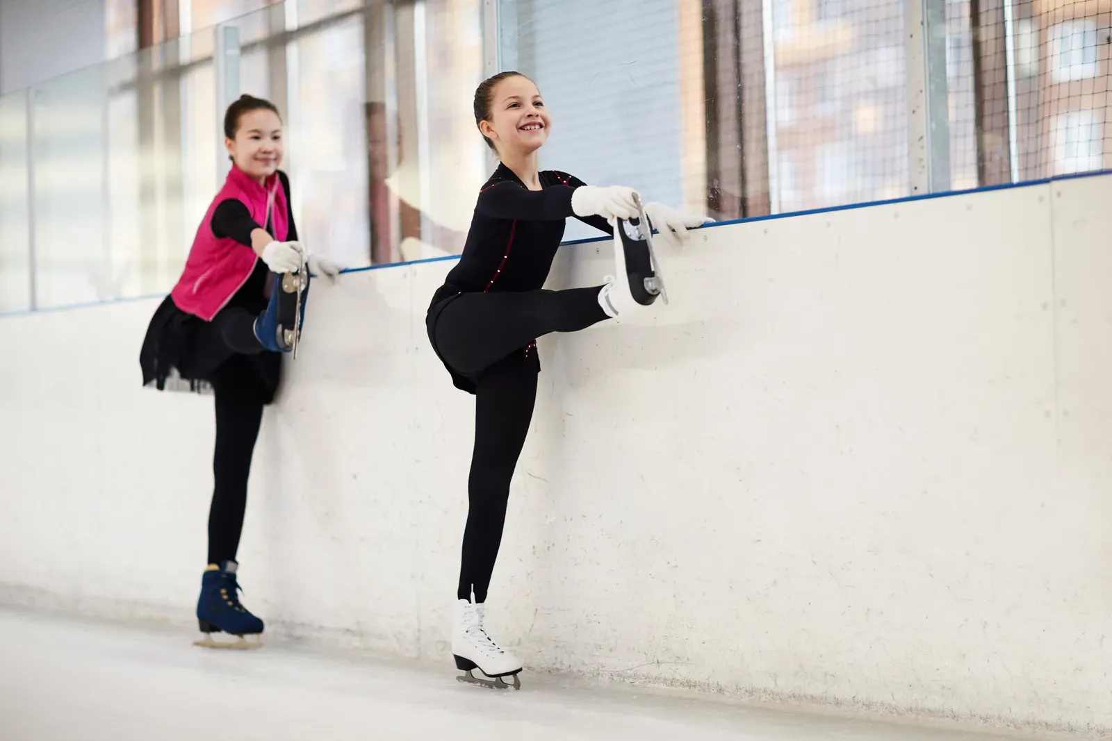 Figure skater stretching during an off ice training session