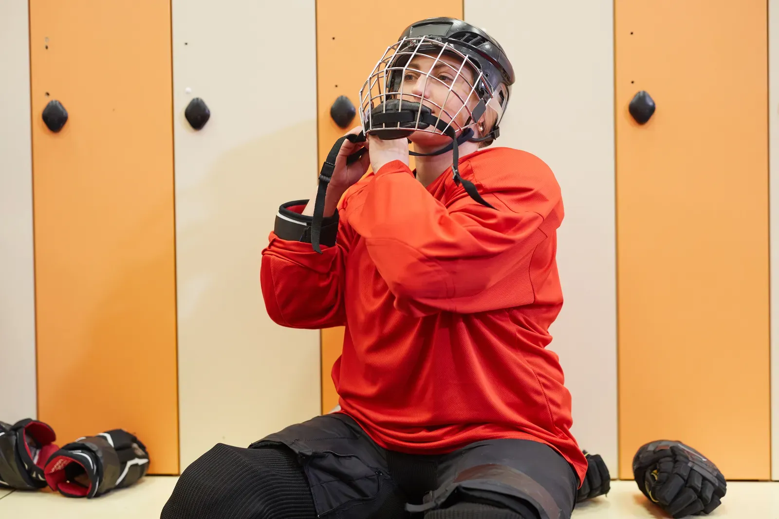 Hockey player training with weights during an off ice strength session