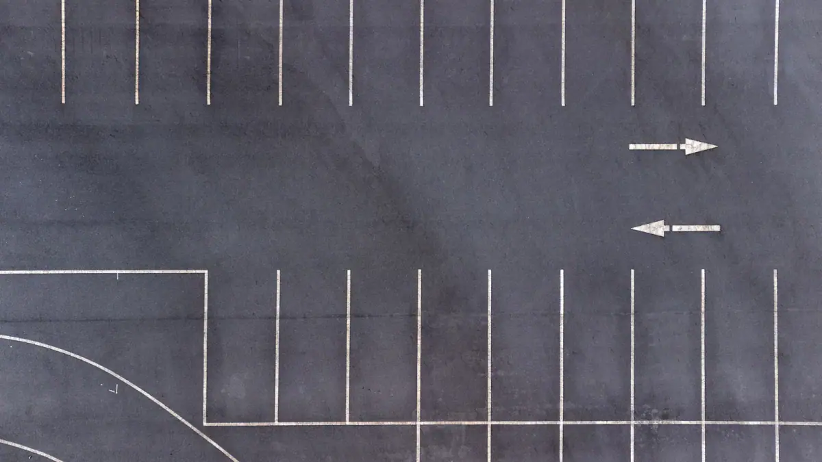 Parking lot seen from above, a reminder of how much parking a training space needs