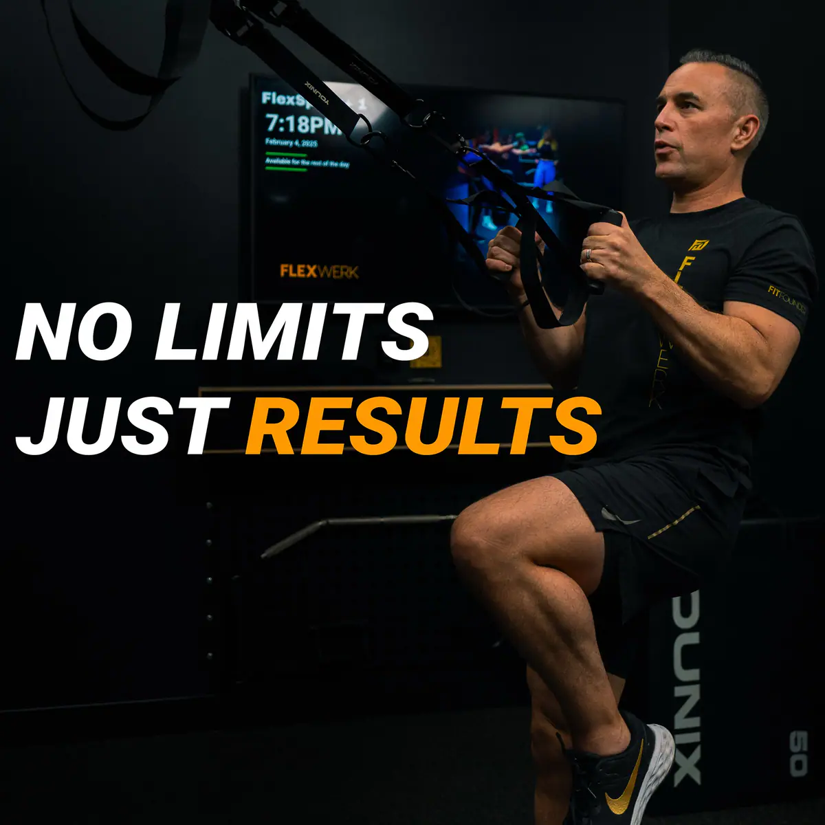 Setting up for a barbell deadlift inside a private training room