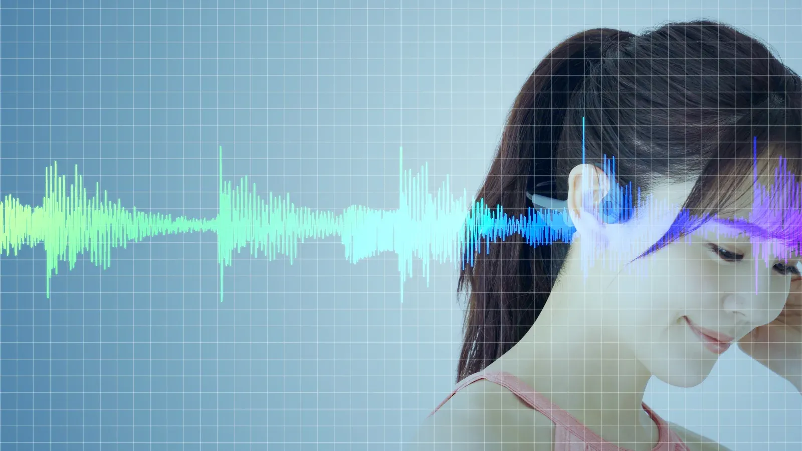 Wearing bone conduction headphones, a young woman enjoys her music