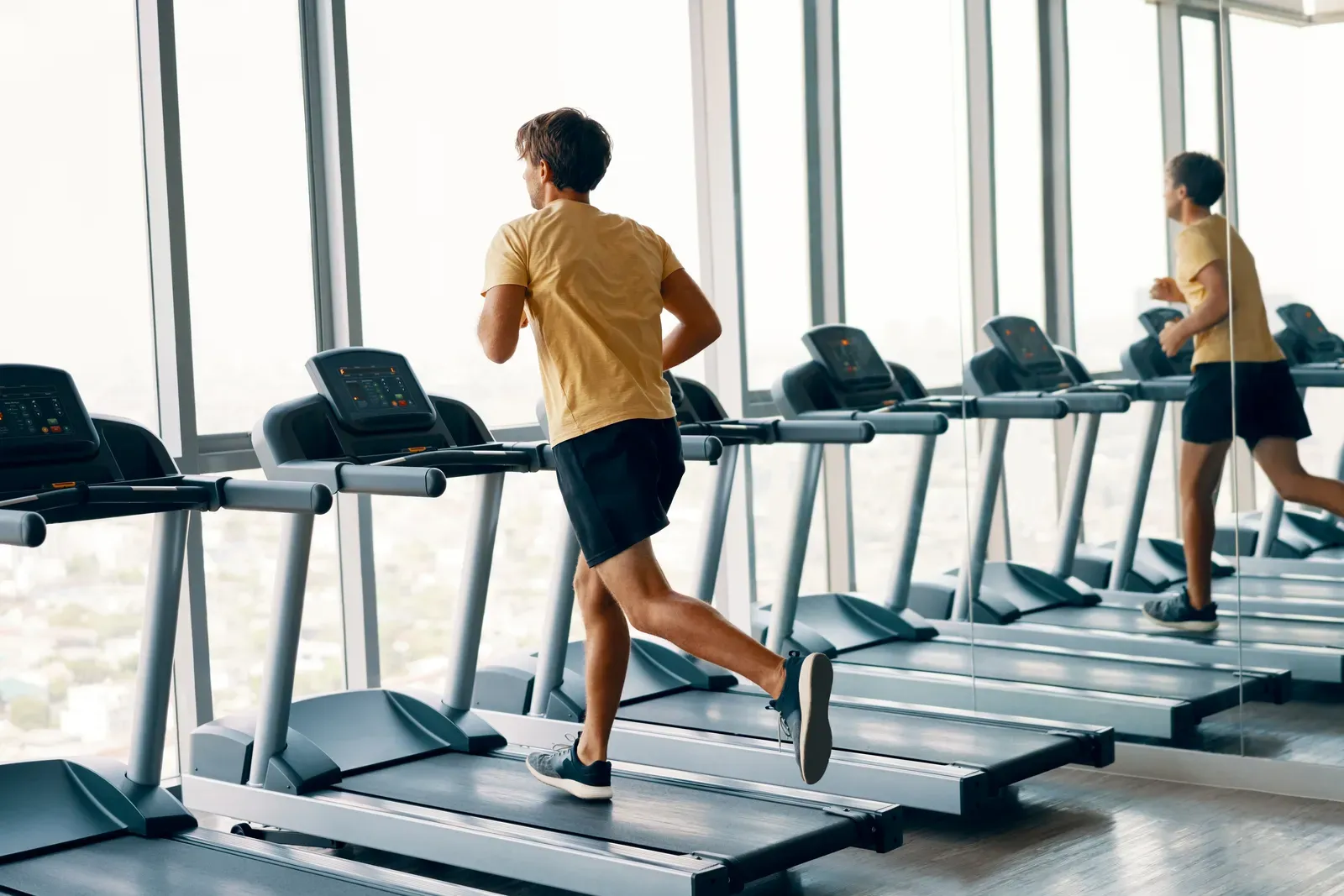 Urban storefront fitness studio with exposed brick walls