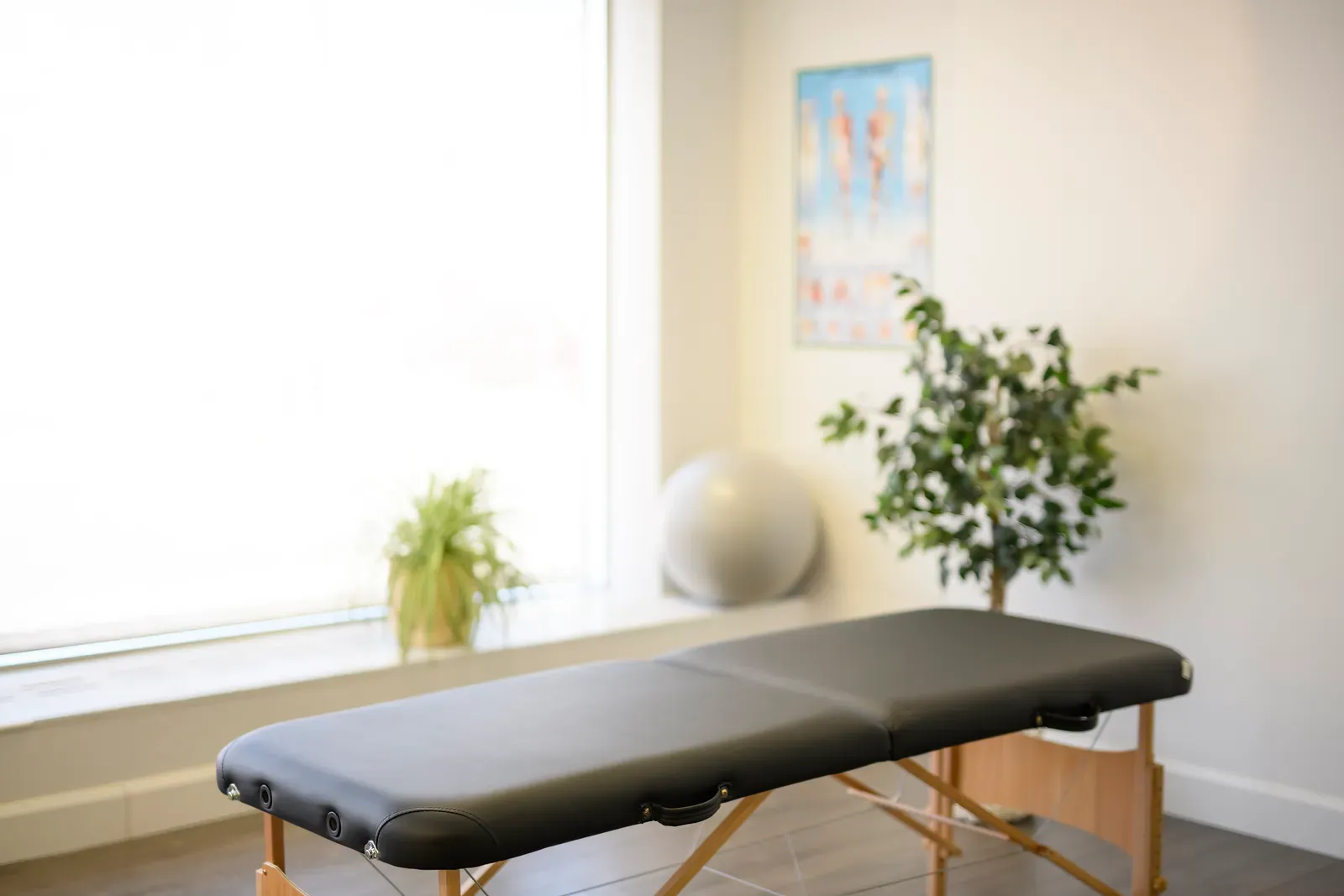 Portable treatment table set up in a quiet therapy room