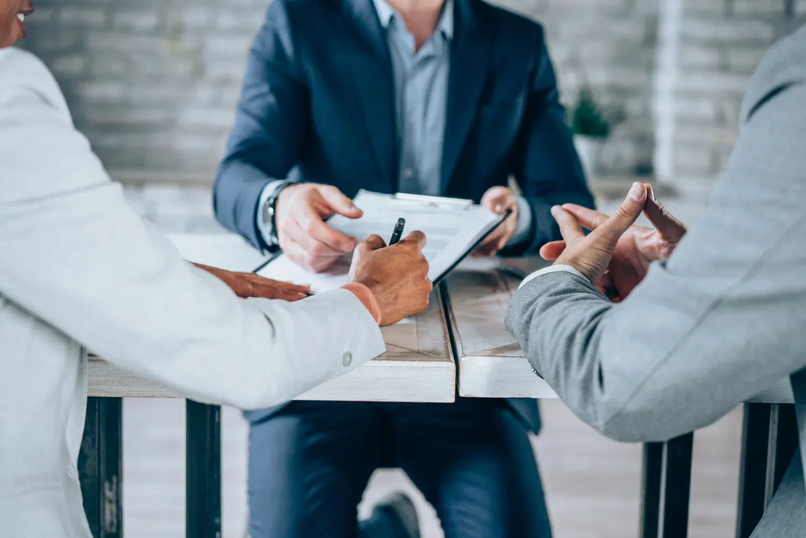 Financial advisor meeting with a couple to talk through their options