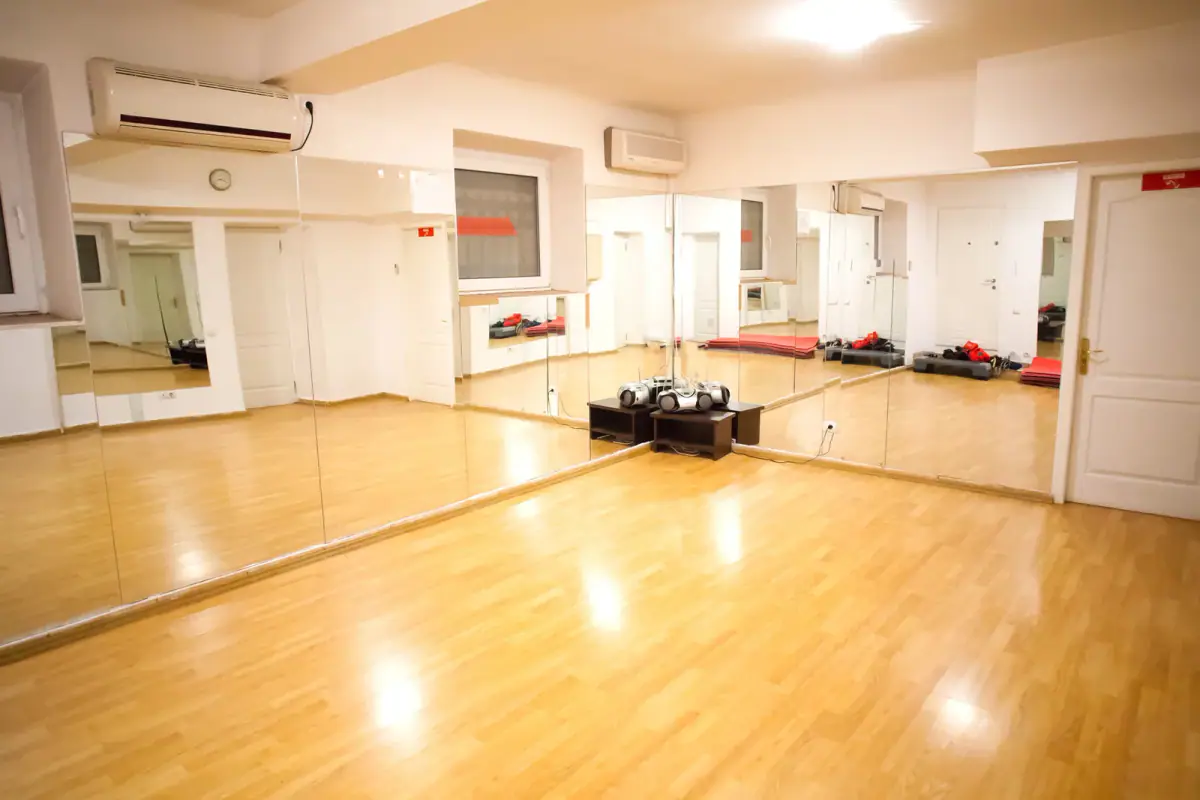 An empty fitness training room, relevant to subleasing space from another trainer