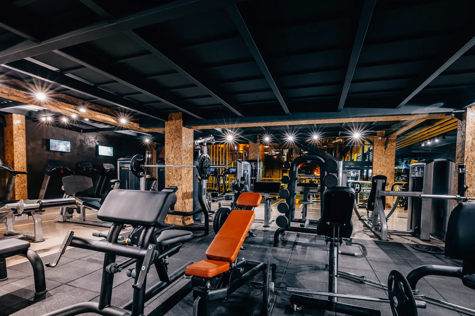 Large modern gym interior with plenty of open floor space