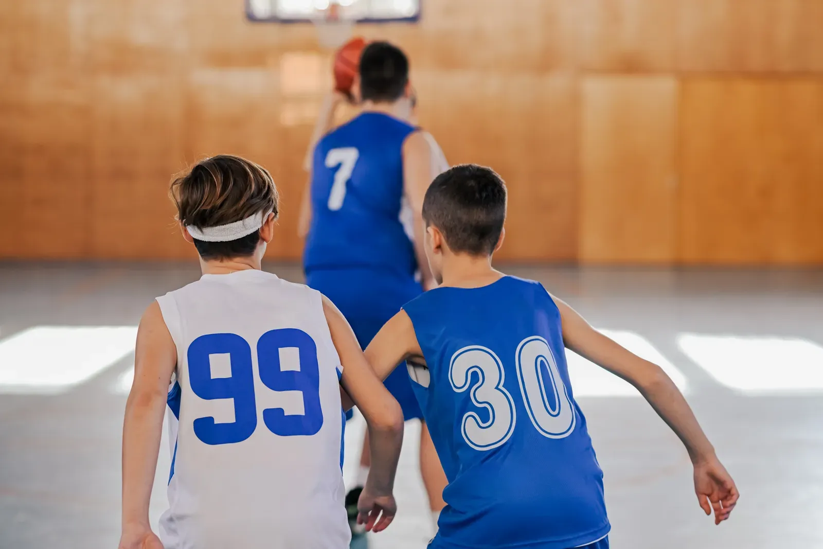 Youth team gathered indoors for a winter training session